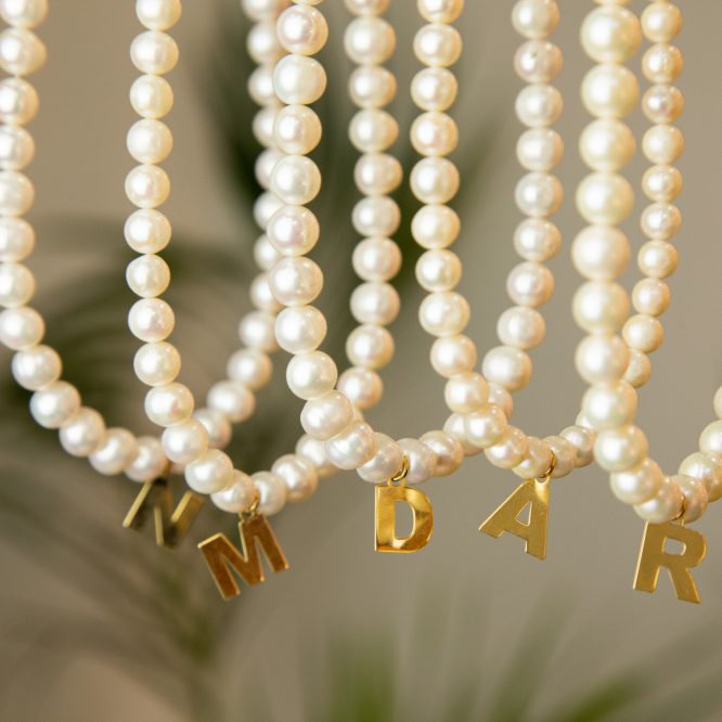 collaret de perles amb inicial